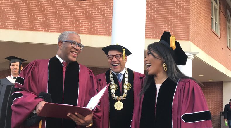 (from left) Tech billionaire Robert F. Smith, Morehouse College President David Thomas and actress Angela Bassett prepare to walk to the graduation ceremonies at the college on Sunday, May 19, 2019. Smith and Bassett received honorary degrees. BO EMERSON/AJC