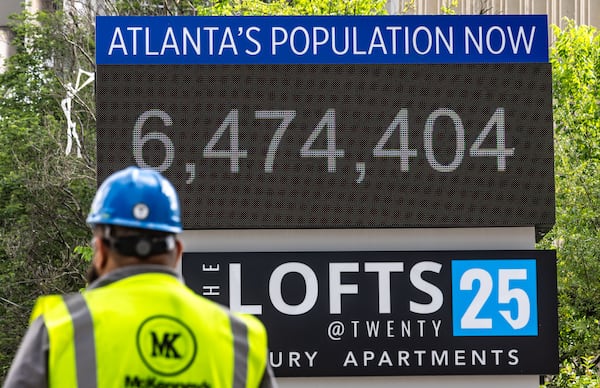 The numbers on the AtlantaÕs Population Now sign located at Brookwood Valley Circle and Peachtree Road in Atlanta keeps on growing as seen here on Wednesday, May 15, 2024. Atlanta is surpassing other cities in population growth. (John Spink/AJC)