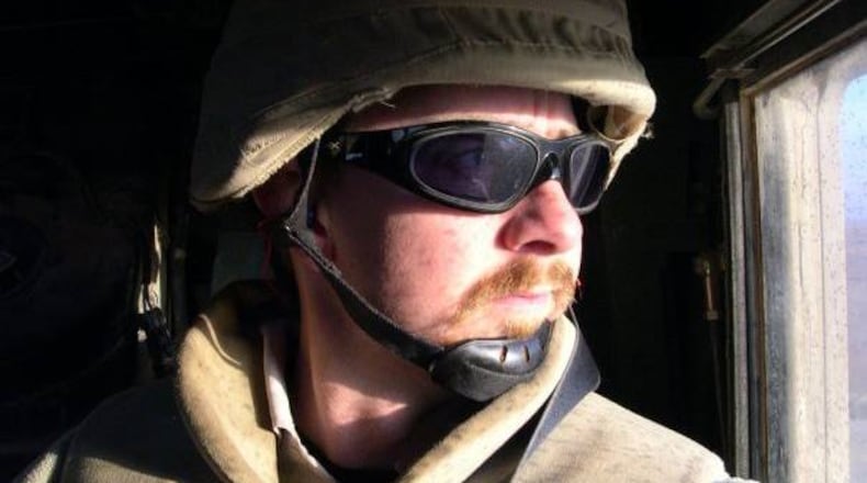 Journalist Jeremy Redmon embedded with U.S. troops three times to cover the Iraq War. In the process he came to recognize the physical, psychological and emotional toll the Vietnam War must have taken on his father. (Courtesy of Jeremy Redmon)
