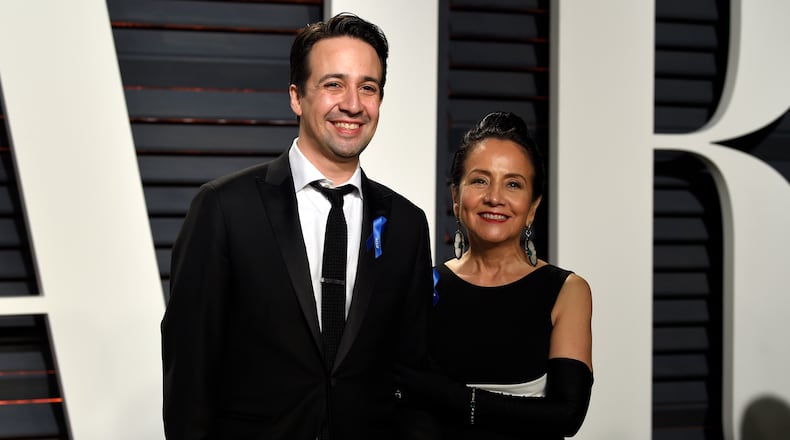 Lin-Manuel Miranda, left, and Luz Towns-Miranda arrive at the Vanity Fair Oscar Party on Sunday, Feb. 26, 2017, in Beverly Hills, Calif. (Photo by Evan Agostini/Invision/AP)