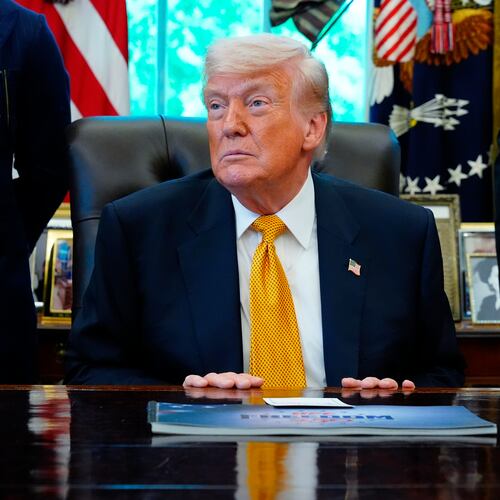 President Donald Trump meets with UFC fighters, Wednesday, May 6, 2026, in the Oval Office of the White House, in Washington. (AP Photo/Jacquelyn Martin)