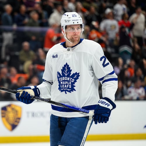 FILE - Toronto Maple Leafs defenseman Brandon Carlo looks on during the first period of an NHL hockey game against the Anaheim Ducks, March 30, 2026, in Anaheim, Calif. (AP Photo/William Liang, File)