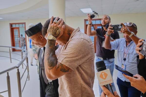 Tampa Bay Rays shortstop Wander Franco touches his head as he walks with his attorney Teodosio Jaquez, left, during a break in his trial on charges of sexual abuse of a minor in Puerto Plata, Dominican Republic, Monday, June 23, 2025. (AP Photo/Ricardo Hernandez)
