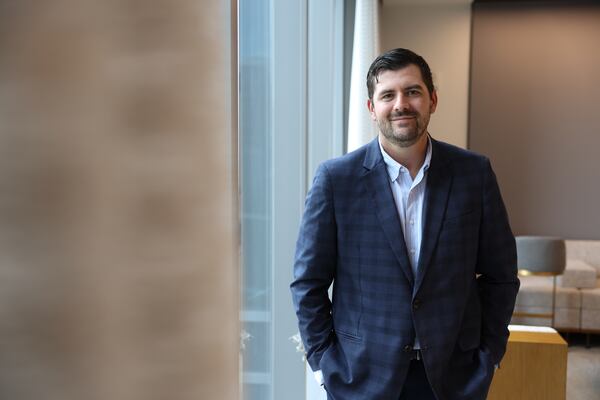 Parker Poe Adams & Bernstein partner Jordan Johnson told the AJC he's excited about joining the law firm's Atlanta office this month after a decade at Hall Booth Smith. (Arvin Temkar/AJC)