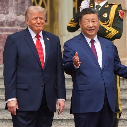 FILE - President Donald Trump, left, participates in a welcome ceremony with China's President Xi Jinping at the Great Hall of the People, May 14, 2026, in Beijing. (AP Photo/Mark Schiefelbein, File)