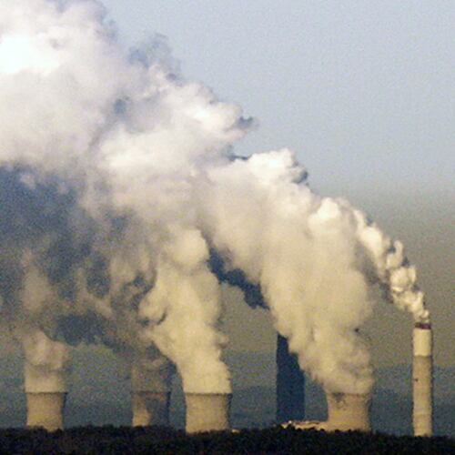 Water vapor from Georgia Power's Plant Bowen's cooling towers and scrubber stacks as seen from the top of Kennesaw Mountain in 2015. Plant Bowen is a coal-fired power station. (Bob Andres/AJC 2015)