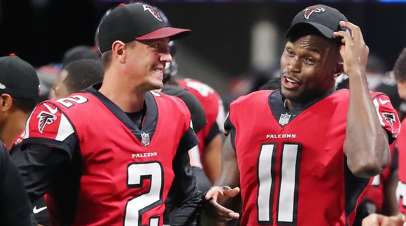 August 31, 2017 Atlanta: Falcons quarterback Matt Ryan and wide reciever Julio Jones, who both did not play in the game, share a laugh on the sidelines during the 4th quarter of their final preseason game against the Jaguars in a NFL football game on Thursday, August 31, 2017, in Atlanta.    Curtis Compton/ccompton@ajc.com