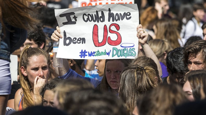 Students rally against gun violence outside Boca Raton City Hall Wednesday afternoon, February 21, 2018. (Lannis Waters / The Palm Beach Post)