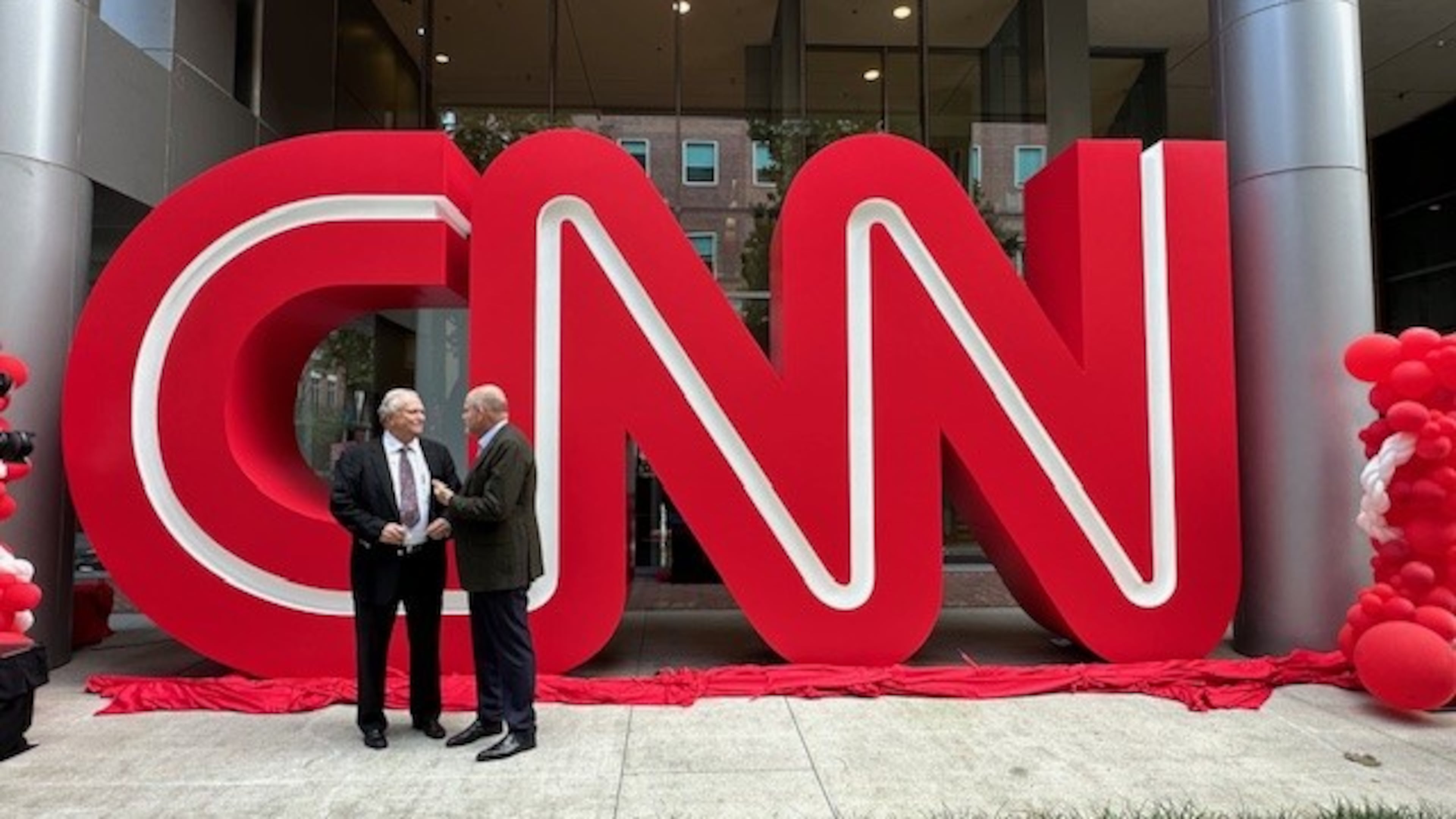 On Sept. 24, 2024, CNN CEO Mark Thompson met with former CNN president Tom Johnson at the Midtown Turner campus in Atlanta for the unveiling of the CNN logo previously at CNN Center for more than 25 years. (Contributed)