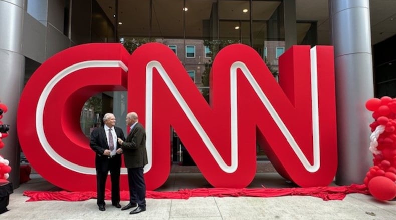 On Sept. 24, 2024, CNN CEO Mark Thompson meets with former CNN president Tom Johnson at the Midtown Turner campus in Atlanta for the unveiling of the CNN logo previously at CNN Center for more than 25 years. CONTRIBUTED