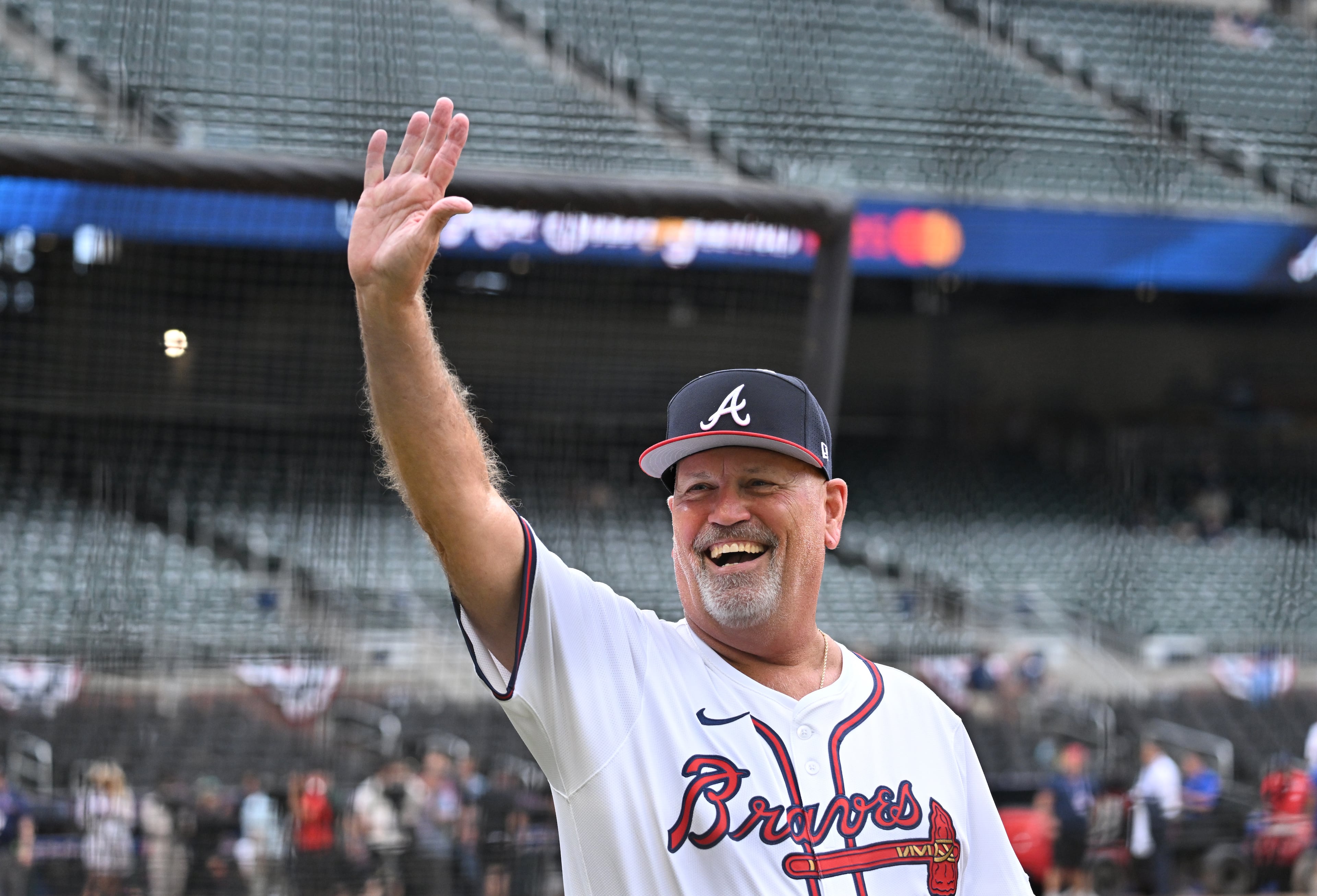 Braves manager Brian Snitker waves to All-Star Game admirers.