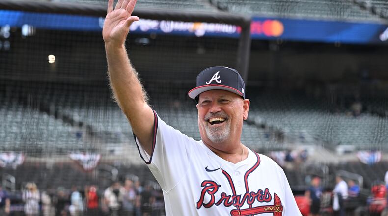 Atlanta Braves manager Brian Snitker waves as he walks on the baseball field before the 2025 MLB All-Star Game at Truist Park, Tuesday, July 15, 2025, in Atlanta. (Hyosub Shin/AJC)