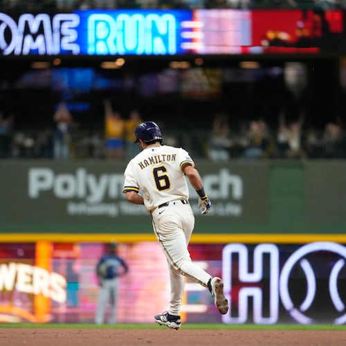 Milwaukee Brewers' David Hamilton rounds the bases after hitting a three-run home run during the sixth inning of a baseball game against the Seattle Mariners, Tuesday, Aug. 18, 2026, in Milwaukee. (AP Photo/Aaron Gash)