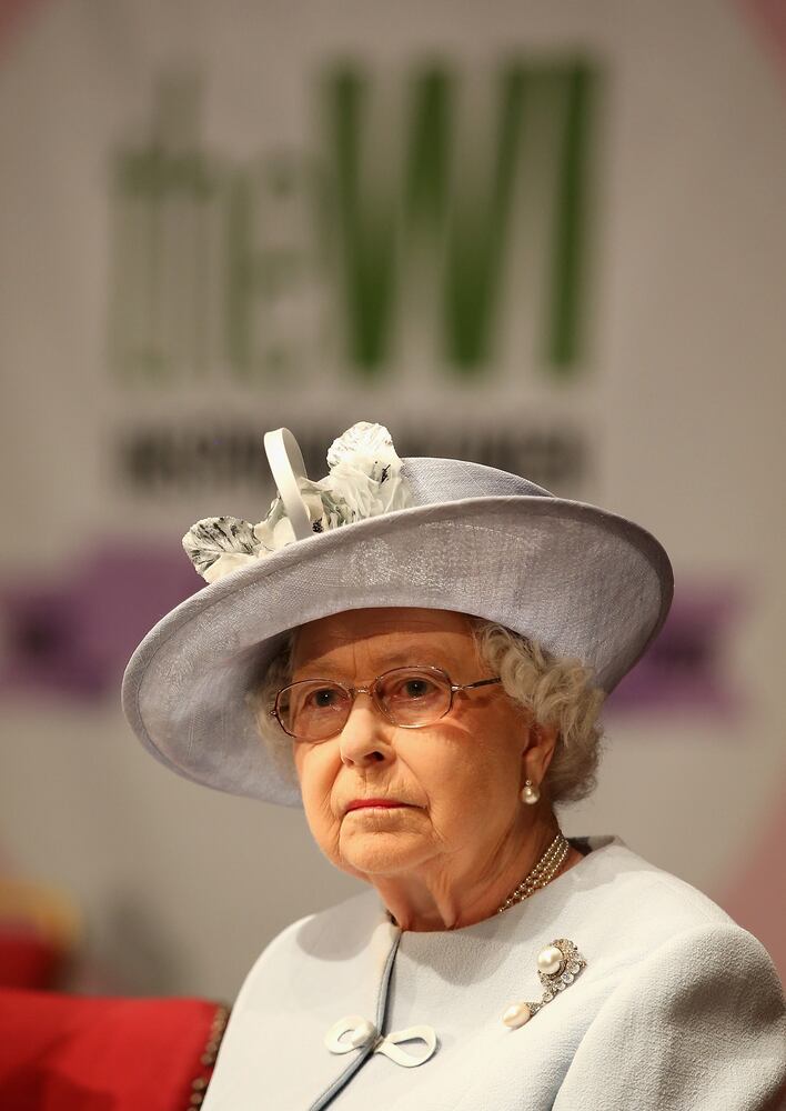 Queen Elizabeth presents the Centenary Women's Institute 'baton'