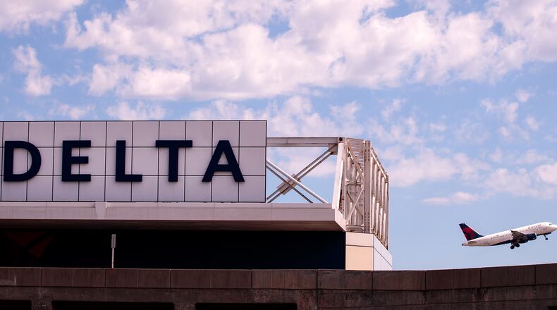 NEW YORK, NY - AUGUST 8: A Delta jet takes off at LaGuardia Airport , August 8, 2016 in the Queens borough of New York City. Delta flights around the globe were grounded and delayed on Monday morning due to a system outage. (Photo by Drew Angerer/Getty Images)
