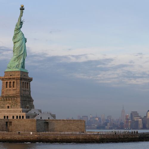 FILE - The lower Manhattan skyline, including the new One World Trade Center building at right, is shown as viewed from near the Statue of Liberty, Jan. 31, 2014, in New York. (AP Photo/Ted S. Warren, File)