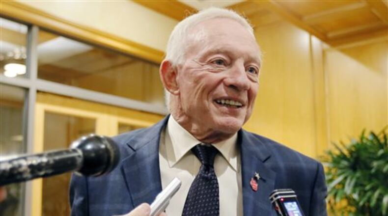 FILE - In this Dec. 2, 2015 file photo, Dallas Cowboys owner Jerry Jones speaks to the media in Irving, Texas. Jerry Jones hinted moments after a surprising 4-12 season ended that the Cowboys might trade down rather than use the No. 4 pick in the draft. (AP Photo/Brandon Wade, File)