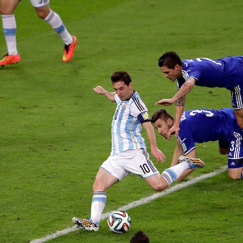 FILE - Argentina's Lionel Messi scores his team's second goal during the group F World Cup soccer match against Bosnia in Rio de Janeiro, Brazil, June 15, 2014. (AP Photo/Sergei Grits, File)
