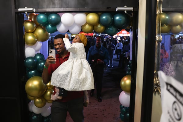 Attendees walking in a shopping area at the Atlanta Ramadan Food Festival in Norcross on Friday, Feb. 27, 2026. (Arvin Temkar/AJC)