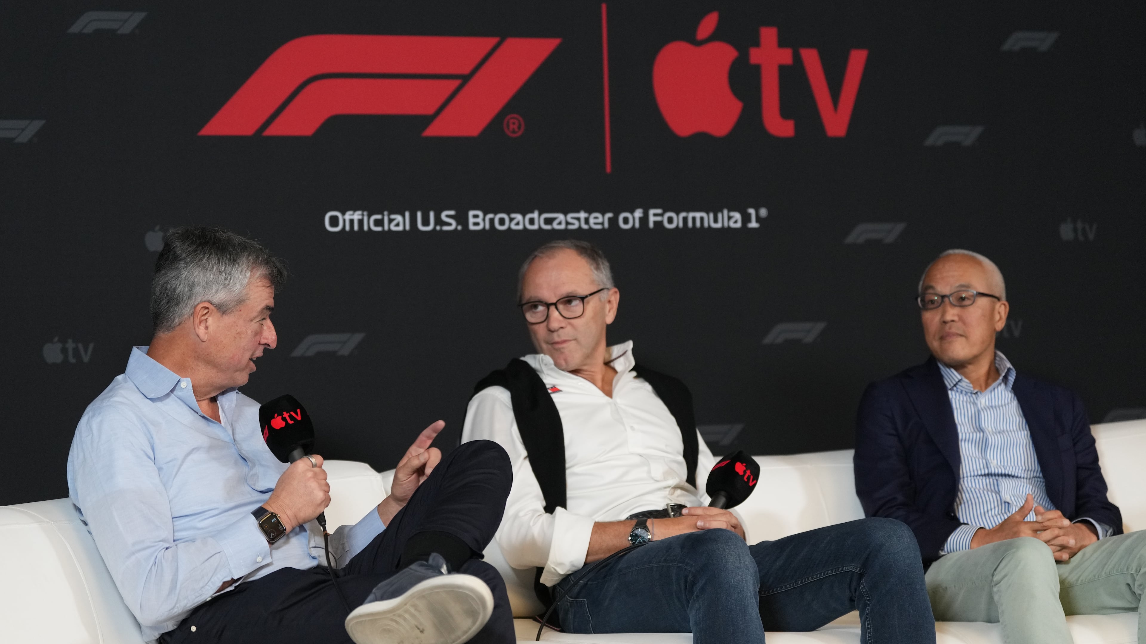 Apple's Eddy Cue, Senior Vice President of Services, left, F1 chairman Stefano Domenicali, center, and Derek Chang, CEO of Liberty Media, right, discuss a five-year partnership with Formula 1 and Apple TV to bring races to its streaming service beginning in 2026 during a news conference at the Circuit of the Americas in Austin, Texas, Friday, Oct. 17, 2025. (AP Photo/Eric Gay)