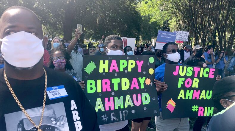 Some attending the rally carried birthday signs for Ahmaud Arbery, who would have turned 26 Friday. (Photo: Bert Roughton)