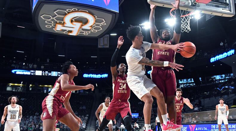 Georgia Tech's guard Michael Devoe (0) gets off a pass around Florida State's forward RaiQuan Gray (1) in the first half Saturday, Jan. 30, 2021, at McCamish Pavilion in Atlanta. Tech won 76-65. (Hyosub Shin / Hyosub.Shin@ajc.com)