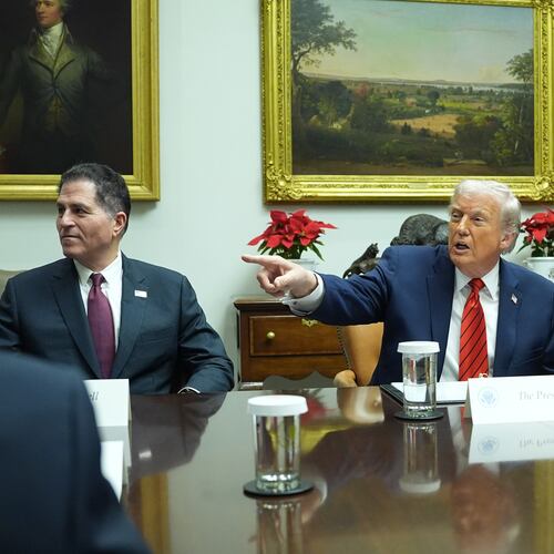 Flanked by founder and CEO of Dell, Michael Dell, left, and Arvind Krishna CEO of IBM, President Donald Trump speaks during a roundtable in the Roosevelt Room of the White House, Wednesday, Dec. 10, 2025, in Washington. (AP Photo/Evan Vucci)