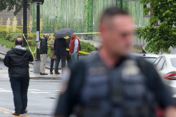 Law enforcement work the scene after two staff members of the Israeli Embassy in Washington were shot and killed outside the Capital Jewish Museum, Thursday, May 22, 2025, in Washington. (AP Photo/Rod Lamkey, Jr.)