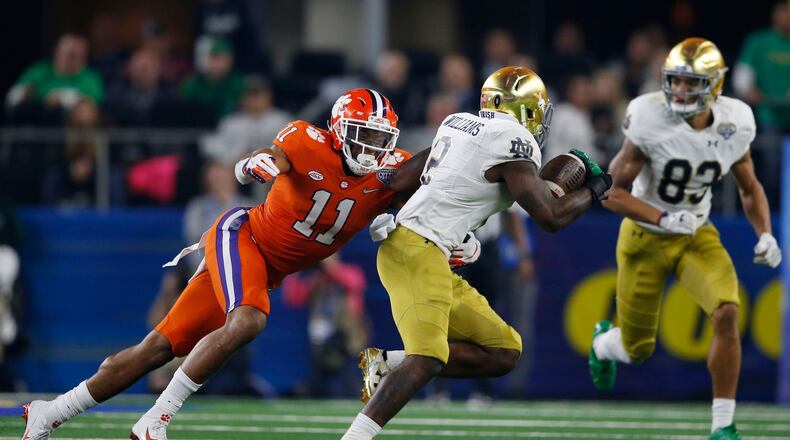 Clemson linebacker Isaiah Simmons tackles Notre Dame running back Dexter Williams during the 2018 Cotton Bowl.