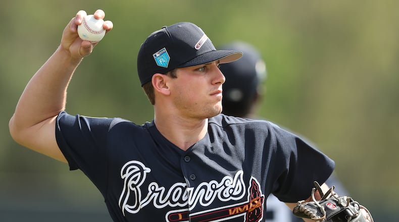 Braves infielder Austin Riley fields a ground ball during practice on Wednesday, Feb 21, 2018, at the ESPN Wide World of Sports Complex in Lake Buena Vista.     Curtis Compton/ccompton@ajc.com
