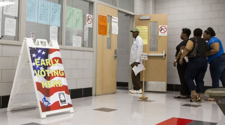 People wait in line for Saturday early voting at the C.T. Martin Natatorium and Recreation Center in Atlanta, Georgia, on Saturday, May 12, 2018. (REANN HUBER/REANN.HUBER@AJC.COM)