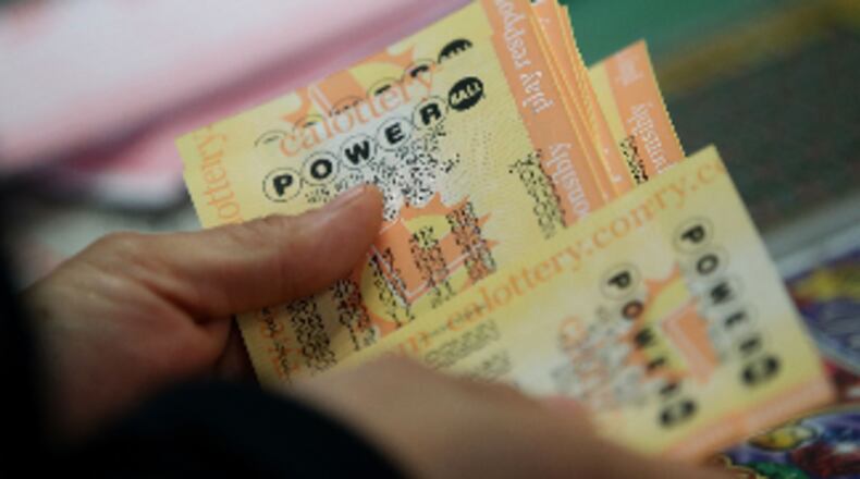 One lucky Atlantan is walking around with a $50K lottery ticket after playing the Powerball. The unclaimed winning ticket was purchased at a Kroger on Peachtree Road.