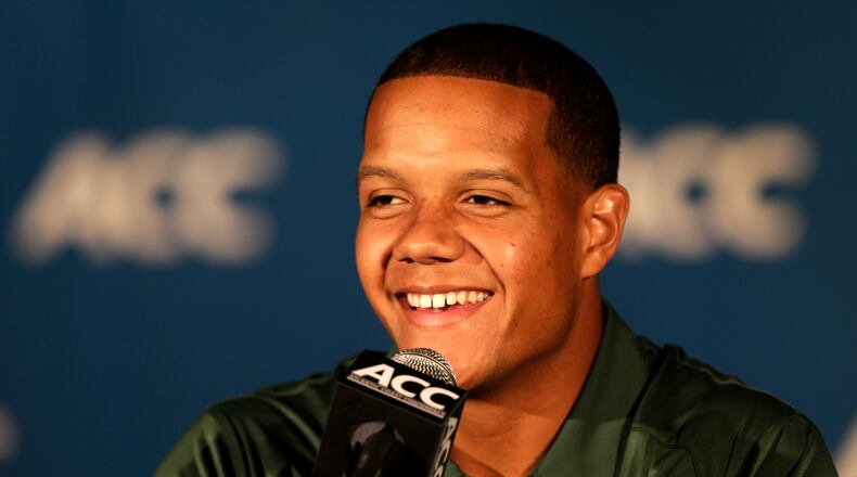 Miami's Stephen Morris speaks to the media during the Atlantic Coast Conference Media Day in Greensboro, N.C., Sunday, July 21, 2013. (AP Photo/Chuck Burton)
