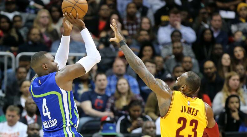 Hawks’ Paul Millsap shoots over Cavaliers’ LeBron James during the first half in a NBA basketball game at Philips Arena on Friday, March 3, 2017, in Atlanta. Curtis Compton/ccompton@ajc.com
