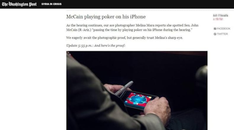Senator John McCain playing video poker during Syria hearing