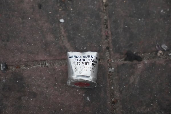 A flash bang canister lies in the street Sunday, June 8, 2025, in Compton, Calif., following an immigration raid protest the night before. (AP Photo/Jae Hong)