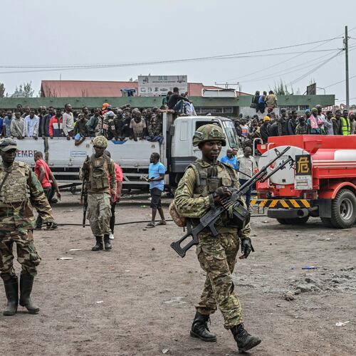 FILE - M23 rebels escort government soldiers and police who surrendered to an undisclosed location in Goma, Democratic republic of the Congo, Jan. 30, 2025. (AP Photo/Moses Sawasawa, File)