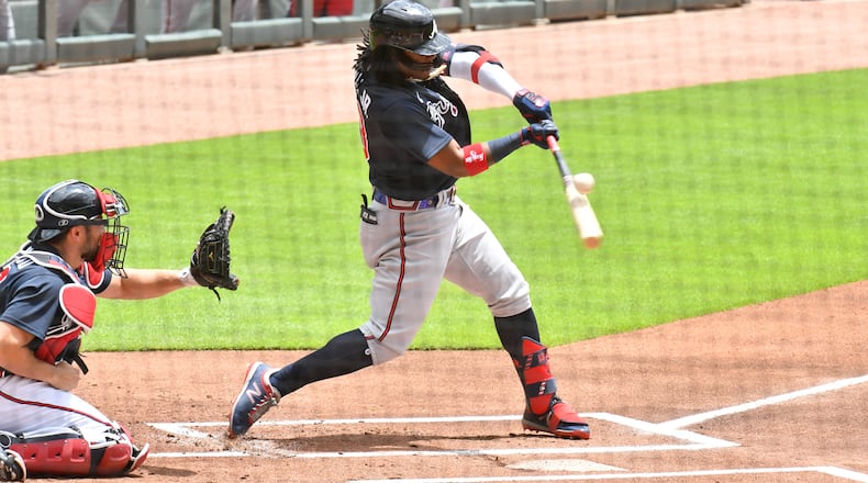 Ronald Acuna Jr. takes a swing. (Hyosub Shin / Hyosub.Shin@ajc.com)