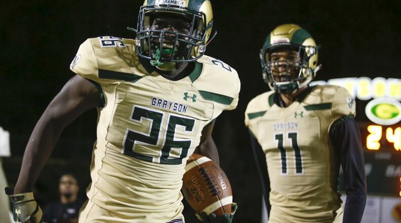 Grayson running back Phil Mafah (26) celebrates with teammates after his touchdown during a 2018 game against Colquitt County. Mafah, a rising senior, is  one of seven Grayson players in the top 102 of 247Sports’ list of best Georgia senior recruits. He is committed to Clemson. (Casey Sykes/Special)