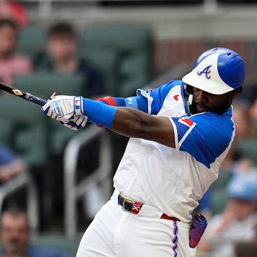 Atlanta Braves outfielder Michael Harris II (23) hits against the Miami Marlins a single in the second inning in the second baseball game of a doubleheader, Saturday, Aug. 9, 2025, in Atlanta. (AP Photo/Mike Stewart)