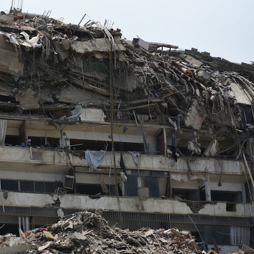 Damaged buildings stand in Catia La Mar, Venezuela, a day after an earthquake and several aftershocks struck the city, Thursday, June 25, 2026. (AP Photo/Jonathan Lanza)