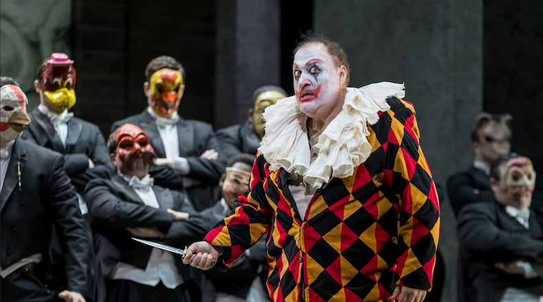 Rigoletto (George Gagnidze), masked as a clown, allows both the wearer and the world at large to detach from the reality of his humanity. Photo: Rafterman / Courtesy of the Atlanta Opera