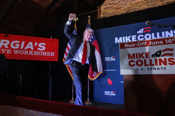 Republican U.S. Senate candidate Mike Collins walks out to speak at his primary election watch party at The Carmichael House in Jackson on May 19, 2026. Collins, who in his second term in the U.S. House representing the 10th Congressional District, advanced to the June 16 runoff that will determine which Republican will face incumbent Democratic Sen. Jon Ossoff. (Arvin Temkar/AJC)