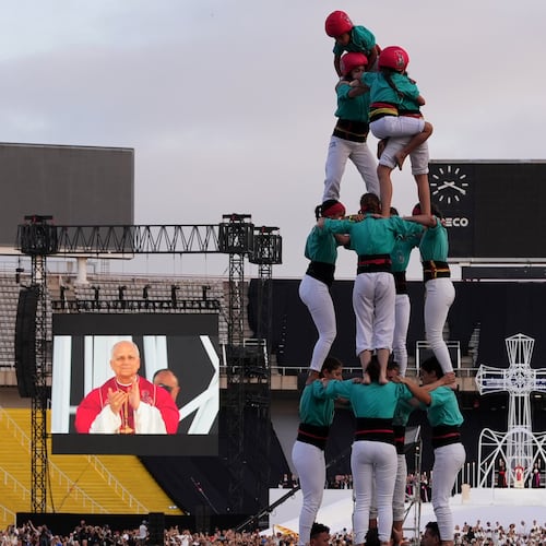 Performers make a human tower, known as Castells, for Pope Leo XIV as he leads a vigil of prayer at the Lluis Companys Olympic Stadium, in Barcelona, Tuesday, June 9, 2026. (AP Photo/Alessandra Tarantino)