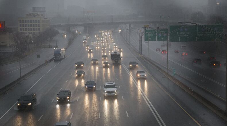 Traffic makes its way through Atlanta as rain showers blanket the area on Friday morning on Dec.28th, 2018. (Photo by Phil Skinner)