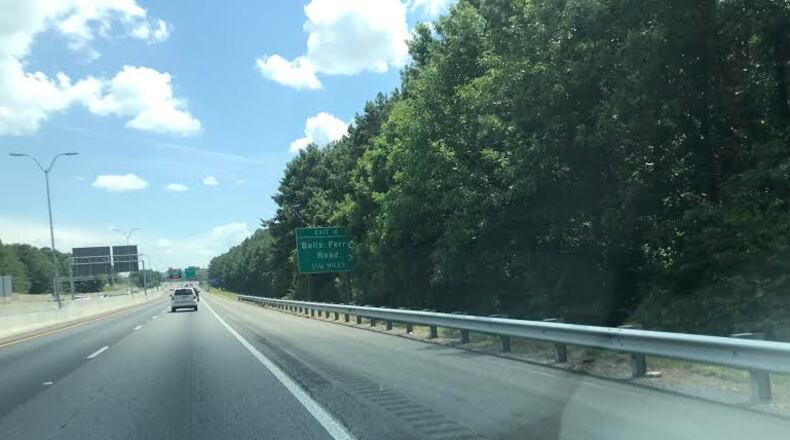 Howard Cox thinks some trees need trimmed near the first sign and extensive trimming done in the second picture. (Photos/Howard Cox)