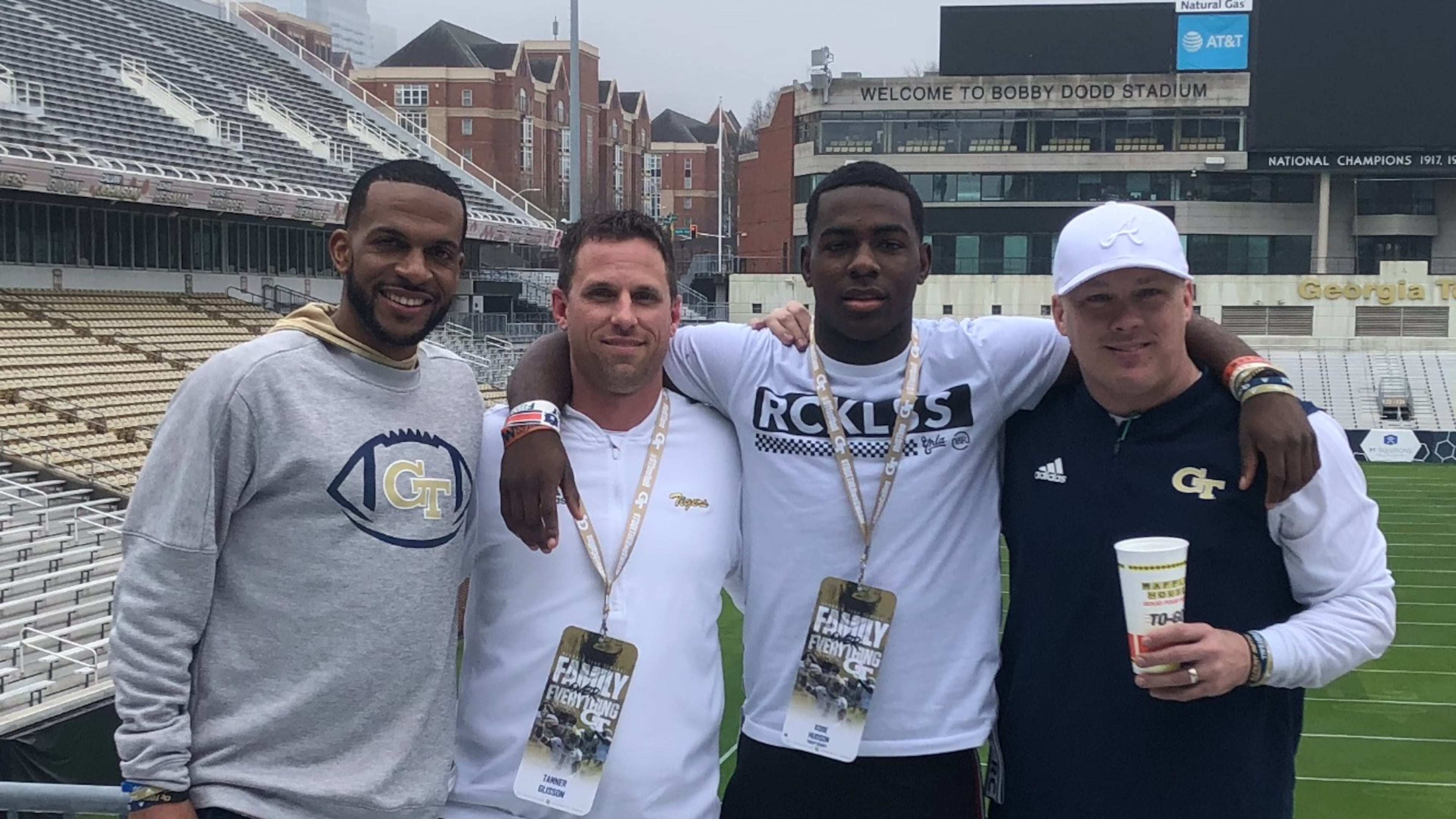 Troup County coach Tanner Glisson (second from left) stands with Troup County High wide receiver Kobe Hudson (second from right) and Georgia Tech coaches Kerry Dixon (left) and Geoff Collins at Bobby Dodd Stadium, Atlanta. (Courtesy of Tanner Glisson 2020)