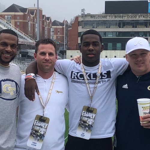 Troup County coach Tanner Glisson (second from left) stands with Troup County High wide receiver Kobe Hudson (second from right) and Georgia Tech coaches Kerry Dixon (left) and Geoff Collins at Bobby Dodd Stadium, Atlanta. (Courtesy of Tanner Glisson 2020)
