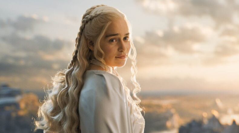 In this image released by HBO, Emilia Clarke appears in a scene from “Game of Thrones.” The 28-year-old Clarke, who plays menacing, white-haired Daenerys Targaryen, aka Khaleesi, aka Mother of Dragons on “Game of Thrones,” is Esquire’s Sexiest Woman Alive. The magazine made the announcement early Tuesday, Oct. 13. (HBO via AP)