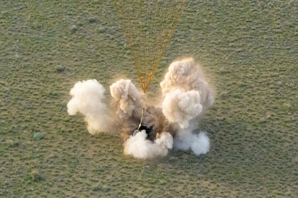 The Soyuz MS-26 spacecraft lands in a remote area near the town of Zhezkazgan, Kazakhstan, with NASA astronaut Don Pettit and Roscosmos cosmonauts Alexey Ovchinin and Ivan Vagner aboard, Sunday, April 20, 2025. (Bill Ingalls/NASA via AP)